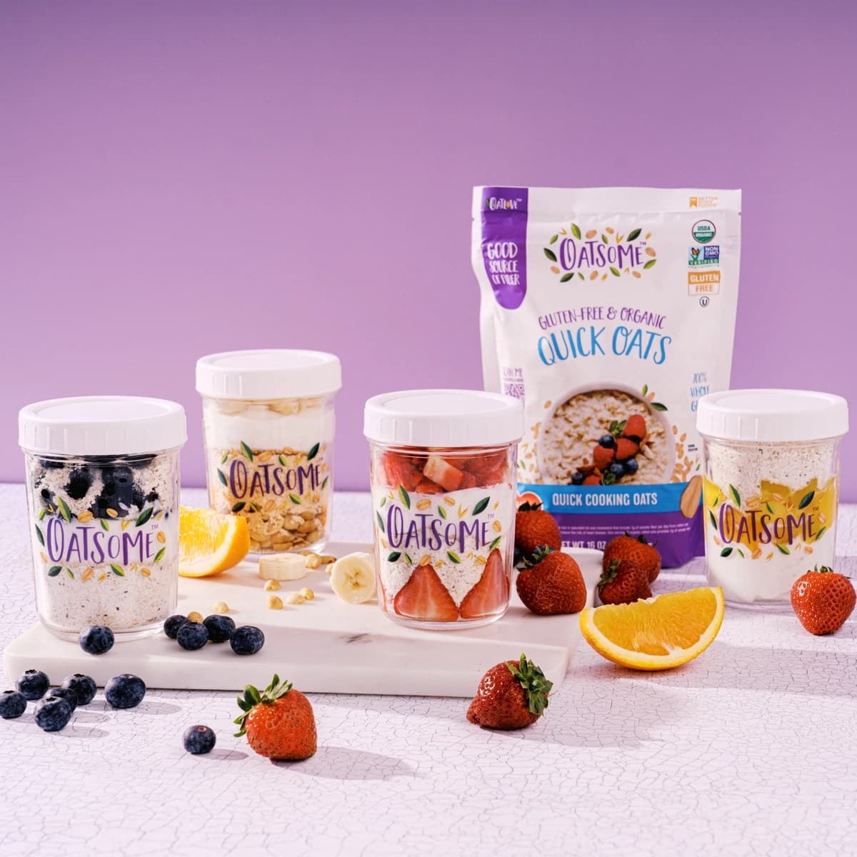 Quick Oats product in jars with fruit and oats. 