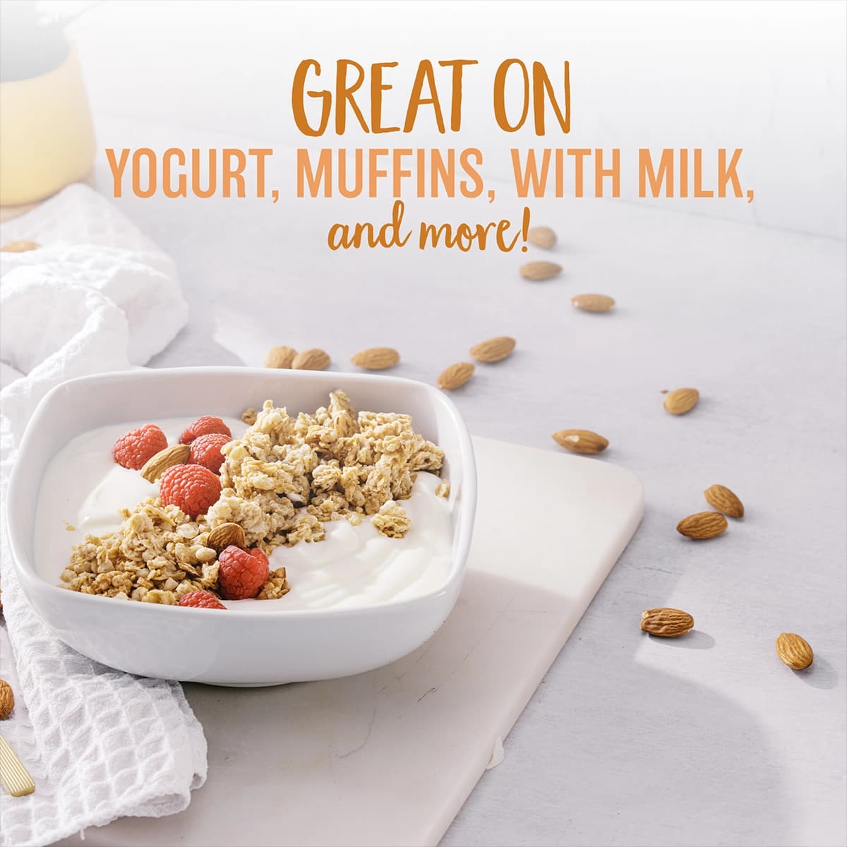 Product on top of yogurt with almonds and raspberrys